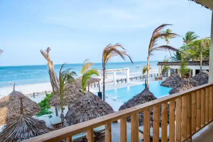 Balcony overlooking the pool and beach
