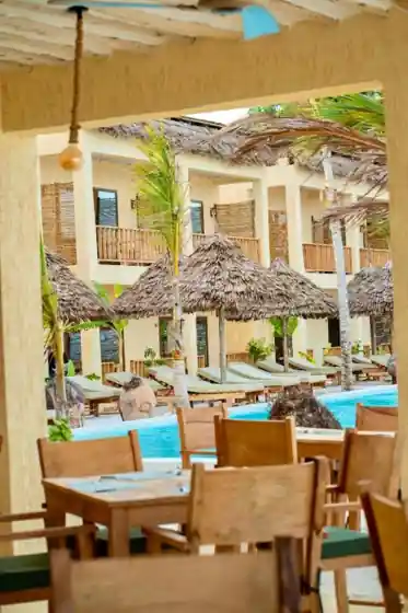 Open-air dining beside the pool